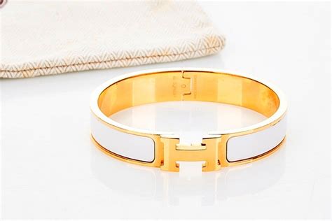 hermes wide h bracelet|hermes bracelet white and gold.